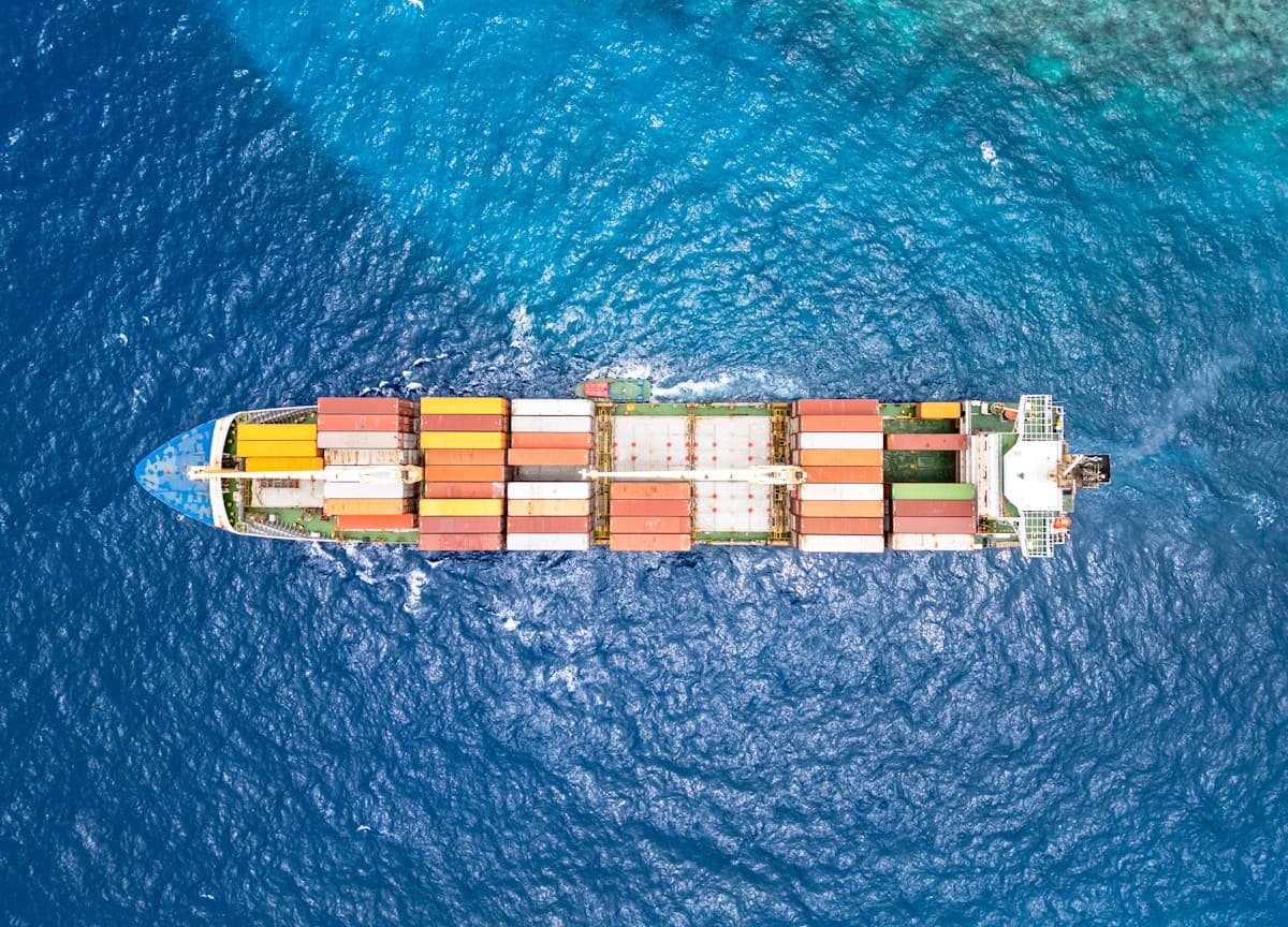 Aerial view of a cargo ship — Photo by Bent Van Aeken on Unsplash